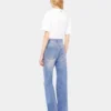 Ausgestellte Jeans mit 1969-Scheiben verziert