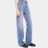Ausgestellte Jeans mit 1969-Scheiben verziert
