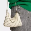 Cremefarbene Paco-Schultertasche aus Kalbsleder