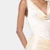 Cremefarbenes, langärmeliges, ärmelloses Jerseykleid