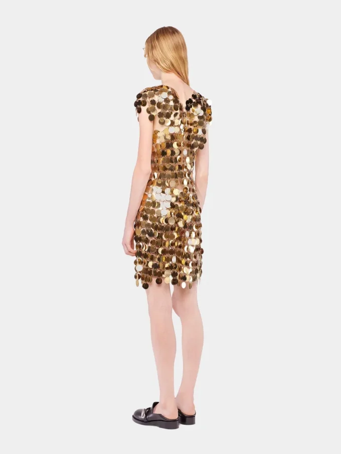 Das ikonische goldene Sparkle-Disc-Kleid Das ikonische goldene Sparkle-Disc-Kleid