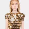 Das ikonische goldene Sparkle-Disc-Kleid Das ikonische goldene Sparkle-Disc-Kleid