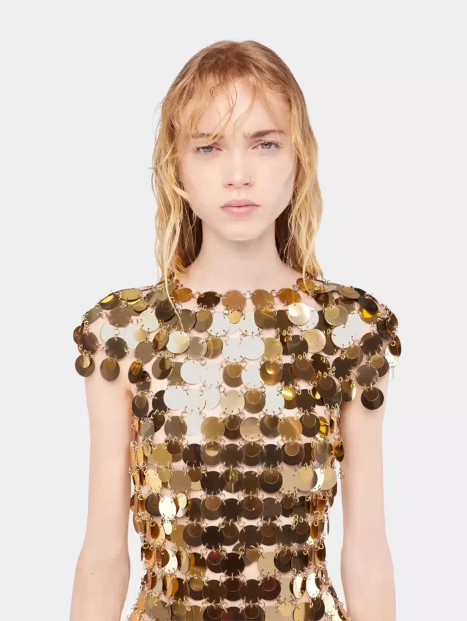 Das ikonische goldene Sparkle-Disc-Kleid Das ikonische goldene Sparkle-Disc-Kleid