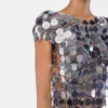 Das ikonische silberne Sparkle-Disc-Oberteil Das ikonische silberne Sparkle-Disc-Oberteil