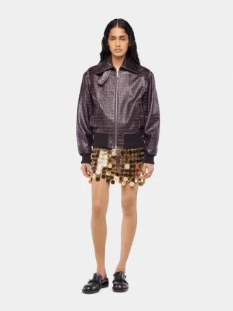 Der Rock mit goldenen Glitzerscheiben