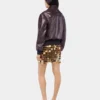 Der Rock mit goldenen Glitzerscheiben Der Rock mit goldenen Glitzerscheiben