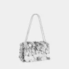 Glitzernde Baguette-Tasche