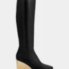 Goldene kniehohe Lederstiefel Goldene kniehohe Lederstiefel