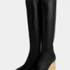 Goldene kniehohe Lederstiefel Goldene kniehohe Lederstiefel