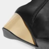 Goldene kniehohe Lederstiefel Goldene kniehohe Lederstiefel
