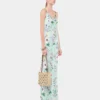 Kleid mit Blumenmuster und Kettenverzierungen