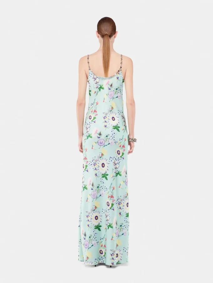 Kleid mit Blumenmuster und Kettenverzierungen
